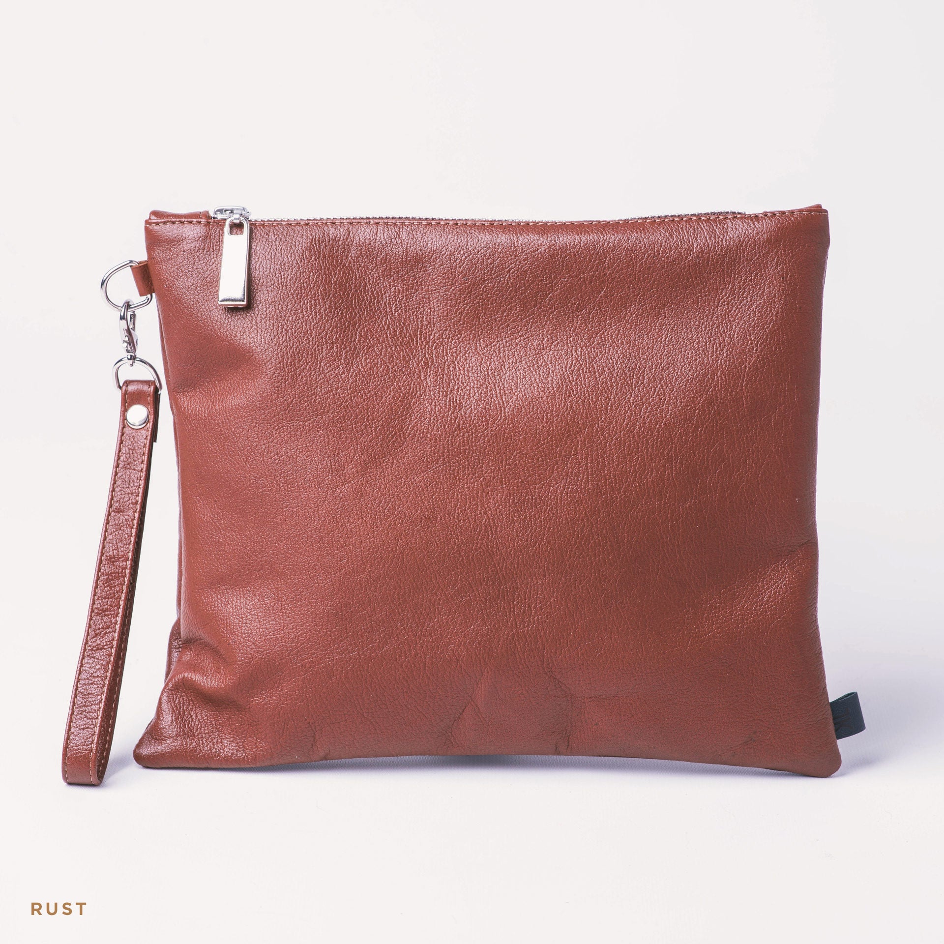 Rust coloured sale clutch bag